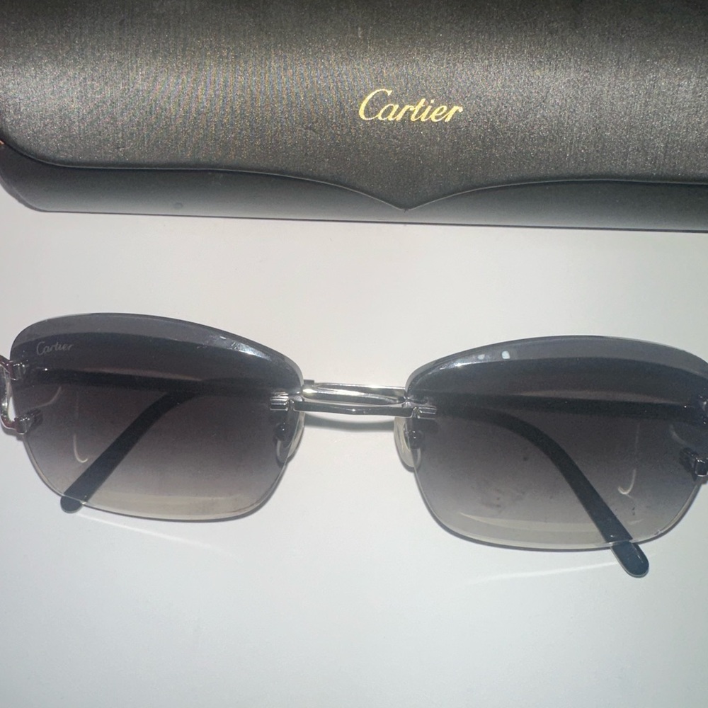 Cartier Silver and Black Rimless Sunglasses